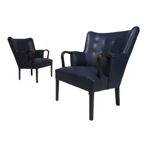 An Pair of Mid 20th Century Rosewood & Leather Armchairs by Kaare Klint