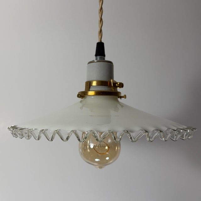 A beautifully hand-blown French white opaline glass pendant light dating to the 1930s. Sourced in Provence, this classic...
