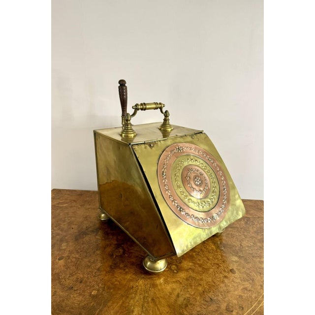 Wonderful antique Victorian brass and copper coal box, having a quality brass coal box with copper inset decoration to the...