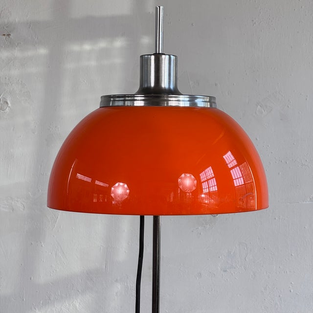 This floor lamp is the "faro" model designed by the celebrated italian designer harvey guzzini, produced under license by...