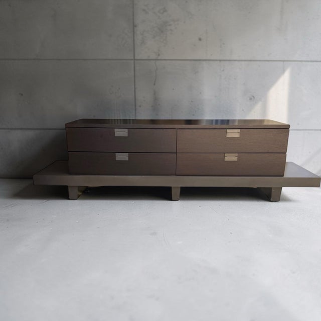 Beautiful console from design legend Christian Liaigre (French, 1943-2020). The Oscuro console, designed in 1997, is...
