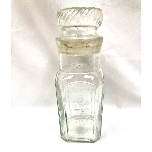 Vintage Belgian glass candy jar with lid. Embossing reads Confiscerie St. Jacques Kestelroot Mouscron, which was a Belgian...