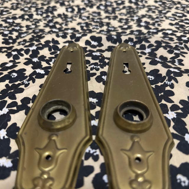 A fine pair of original Art Deco architectural door plates featuring a classic "skyscraper" stepped profile and stylized...