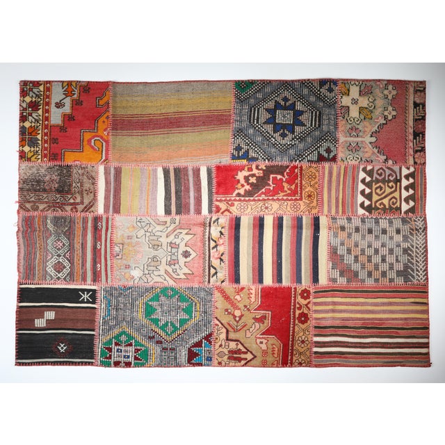 Vintage Turkish Anatolian Kilim Patchwork Rug – Modern Bohemian Design This striking patchwork kilim is handcrafted from...