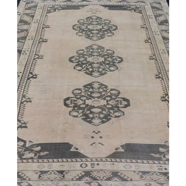 Measures: 7'5 x 9'9 Vintage Turkish Oushak Rug in Pastel and Dark Green Floral Patterns 7'5 x 9'9. Keivan Woven Arts / Rug...