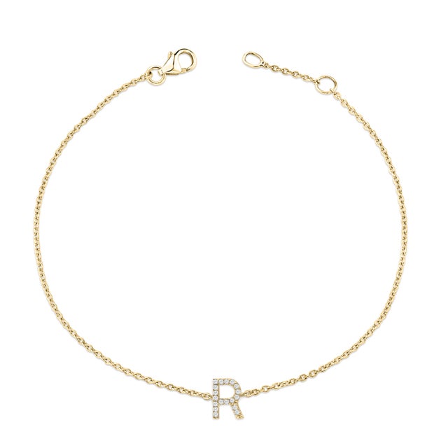 Immerse yourself in the understated elegance of this 10K yellow gold bracelet, for an enrapturing shimmer that captures...