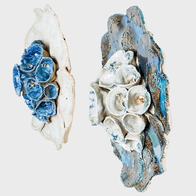 Playful round wall lights/flush mounts with an unusual shape, made with rich colored blue, white and brown ceramics,...