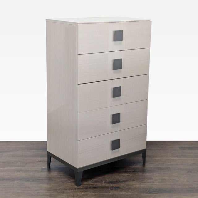 This Alf + DaFre dresser features a modern design with a light wood finish and five spacious drawers. The dresser includes...