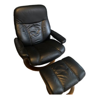 Ekornes Stressless Black Leather Recliner and Ottoman With Wood Base For Sale