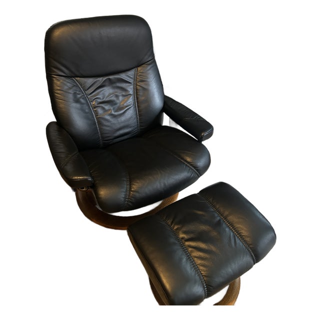 Ekornes Stressless Black Leather Recliner and Ottoman With Wood Base For Sale