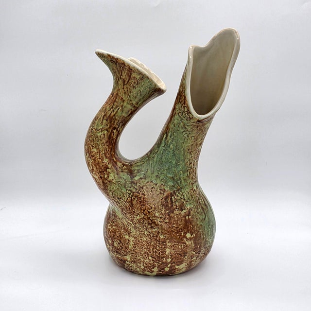 A striking 1952 Richard Ginori San Cristoforo Italian ceramic twin-neck vase with a sculptural mid-century form and richly...