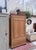 This 19th‑century English pine armoire is a beautiful example of practical country furniture elevated by time. Built from...