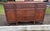 Vintage Buffet in a Red Flame Mahogany Wood with Ample Storage Five Drawers and Two Door Cabinet Space .