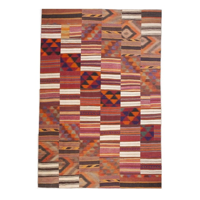 This is a striking and highly authentic room-sized antique Turkish Village Kilim. Dating back to circa 1930, this pre-war...