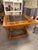 18th-century trestle table with slate top and marquetry. The square tabletop features an authentic, dark slate inlay. The...