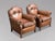 Pair of Mid 20th-Century French Brown Leather Club Armchairs A superb pair of mid 20th-century French leather club...