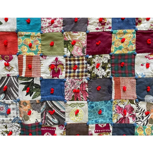 Antique hand-made patchwork quilt. Quilt top has multi color 3 and 2.5 inch squares stitched together by machine then tied...