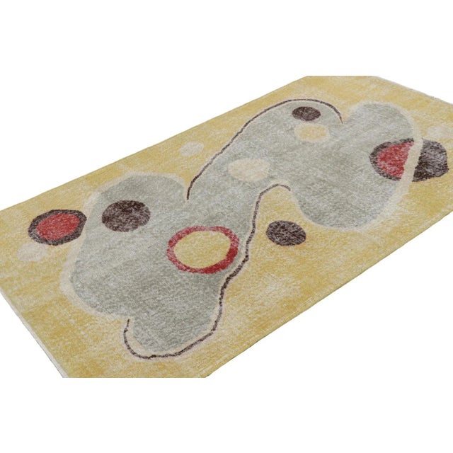 This 4x7 Vintage Art Deco rug is believed to be a rare work from mid-century artist Zeki Müren. Hand-knotted in wool circa...