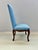 Dining chair in carved wood with floral decoration. Upholstered in blue fabric. Both the upholstery and the wood are in...