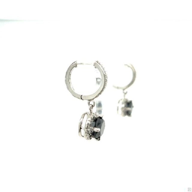 These earrings have Natural Black Round Cut Diamonds that weigh 4.03 Carats and Natural Round Cut White Diamonds that...