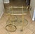Larger scale Italian Neo-Classic style 2-tier brass bar (or tea cart) with inset glass shelves. Has a "made in Italy" label.