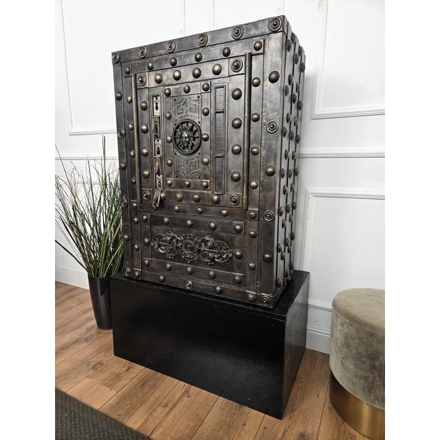Beautiful and rare example of late 18th century Italian master blacksmith craftsmanship, this antique studded safe with...