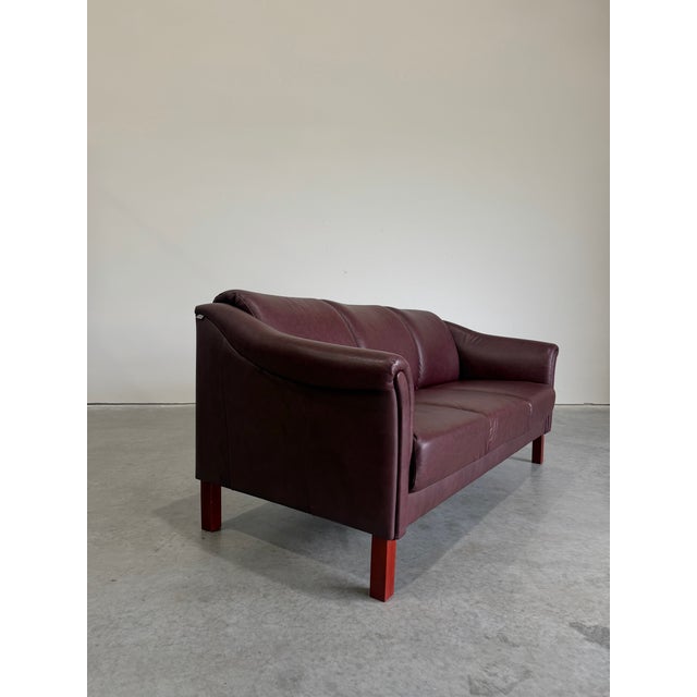 Vintage Danish Burgundy Leather Sofa by Hjort Knudsen. Contemporary post modern design in high quality burgundy leather,...