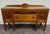This is a beautiful vintage American Jacobean or Tudor Revival walnut buffet, sideboard, or server dating to the...