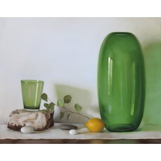 Green Glass, ca. 2015 by Cecilia Thorell | Oil on Linen Panel Still life with green glass and lemon For Sale