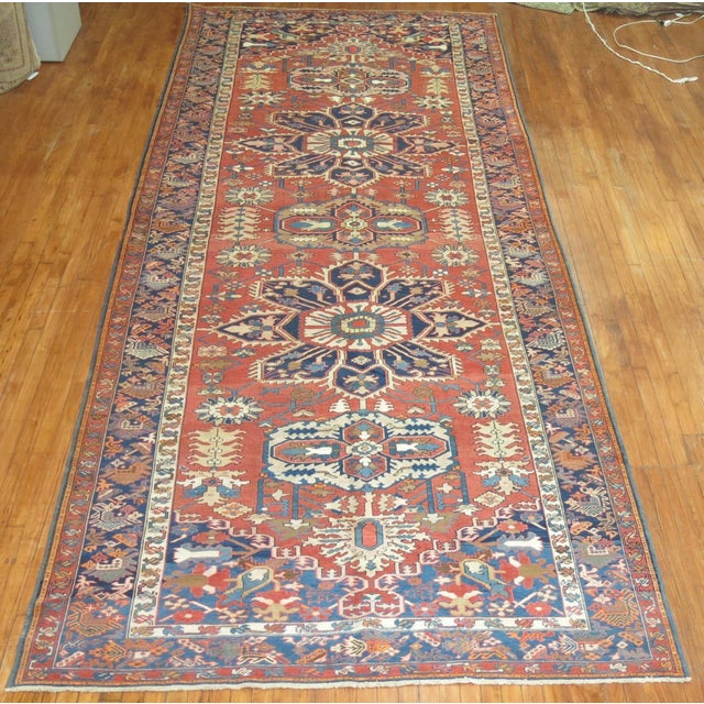 A rare early 20th-century Heriz gallery-size corridor rug Details rug no. 8806 size 6' 4" x 15' 8" (193 x 478 cm)