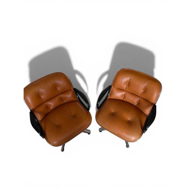 Stunning pair of mid-century modern design icons: the executive chairs by charles pollock for knoll. This specific vintage...