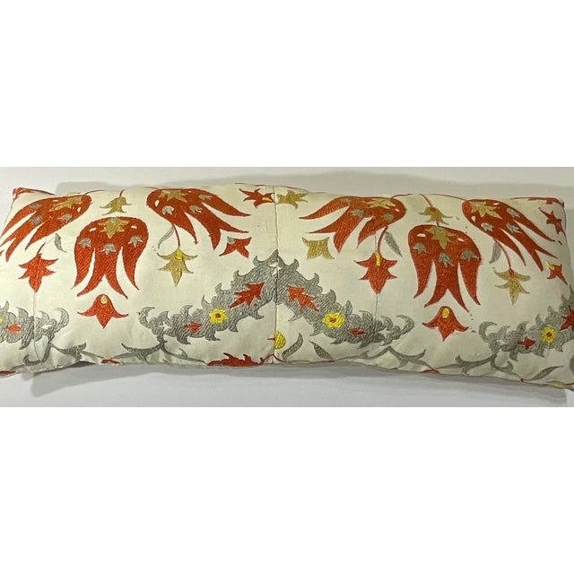 Bring a piece of Central Asian artistry into your home with this exquisite, hand-embroidered Suzani pillow. This unique...