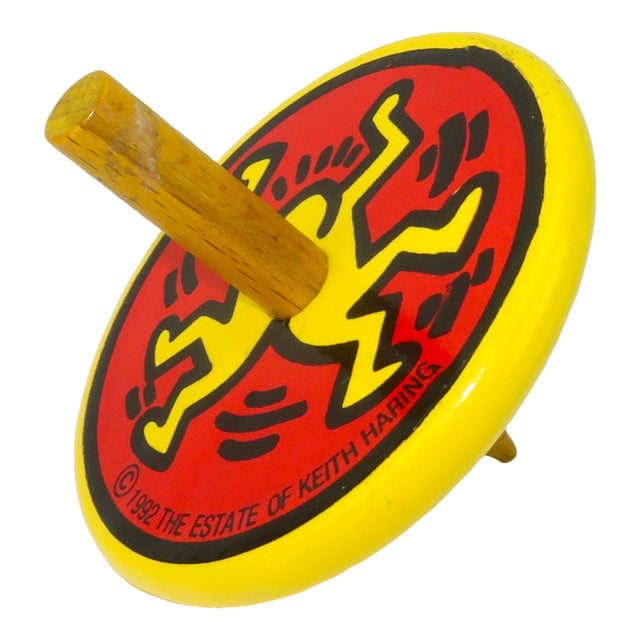 Keith Haring Yellow Lacquered Wood 'Dancing Man' Spin Top, 1992 For Sale