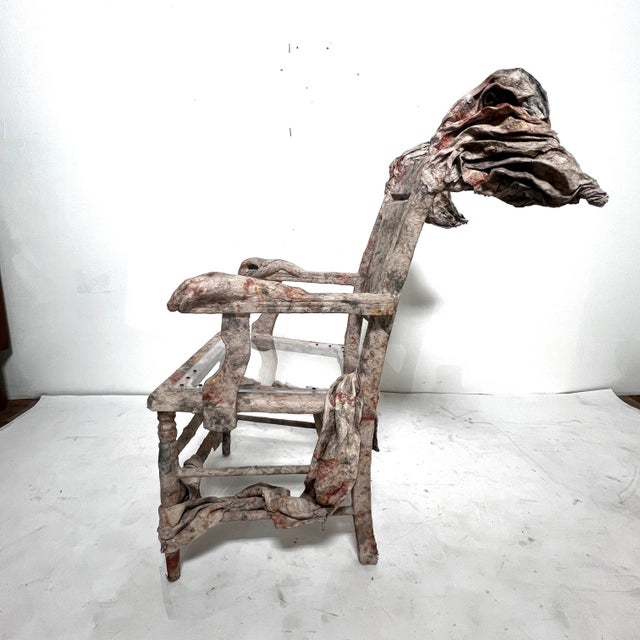 A sculptural “wing” chair and draped table by the award winning artist Ann Johnson of Muncie, Indiana. Under the pseudonym...