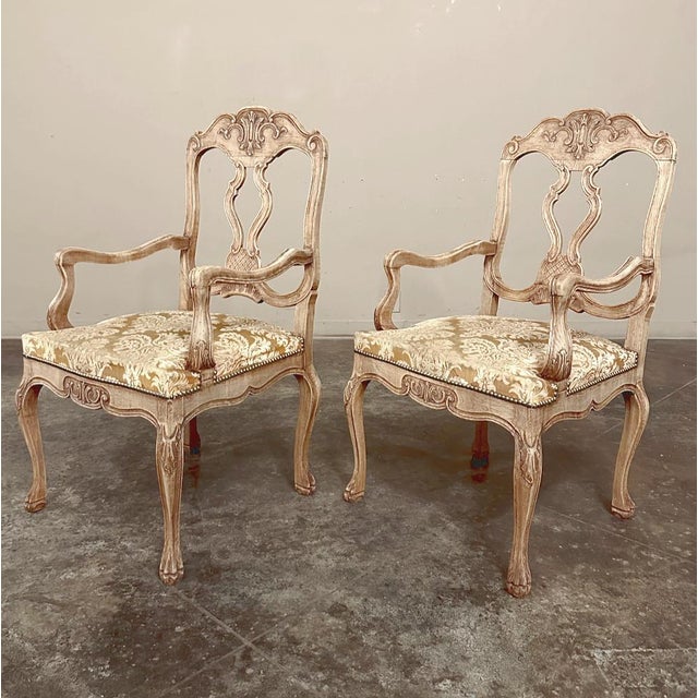 Antique Liegoise Louis XIV Armchairs in Stripped Oak are an excellent example of the fine craftsmanship for which the...