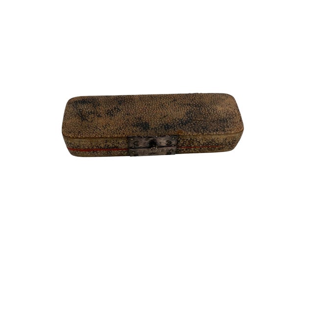 A beautifully preserved early 19th century shagreen case, distinguished by its richly textured natural surface and elegant...