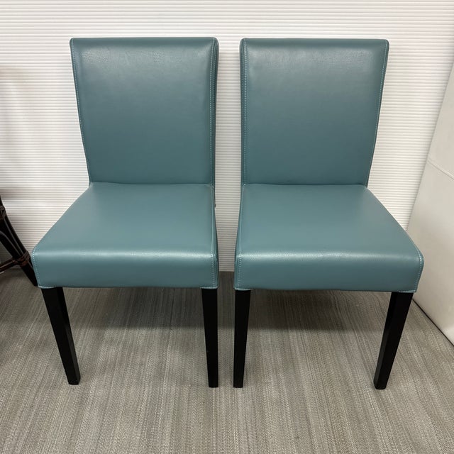 Design Plus Gallery presents a Pair of Lowe Dining Chairs from Crate & Barrel. Stylish + contemporary, the Lowe wraps...