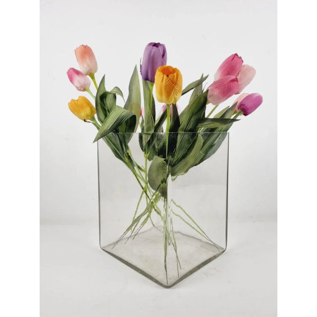 The patina of the glass and the bubbles that indicate its craftsmanship make this timeless, timeless art glass vase truly...