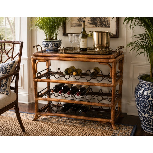 A beautifully crafted 1990s bar cart by Maitland-Smith, showcasing the brand’s signature blend of natural materials and...