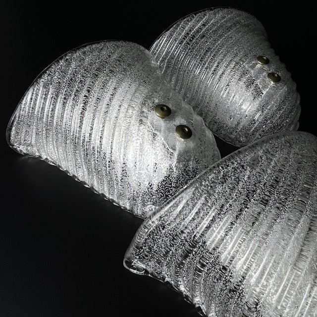 Beautiful original murano wall lamps made in italy in the 1970s. the lamp is in good vintage condition, with no damage....