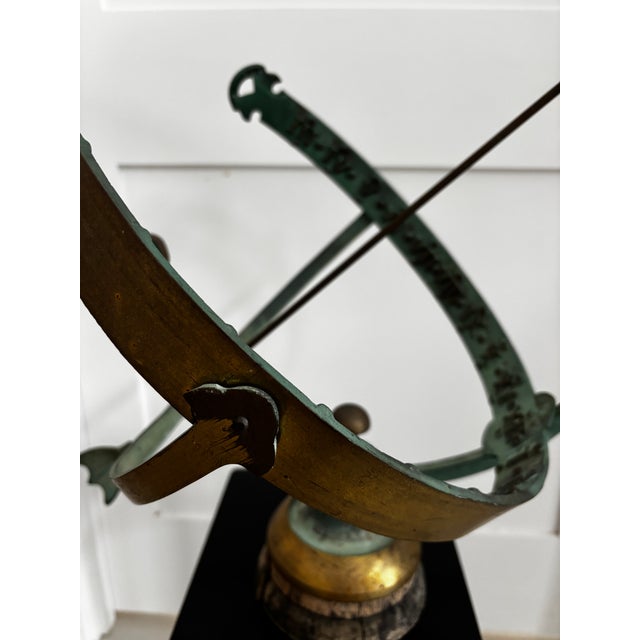 Vintage brass sundial armillary on wood base. Beautiful verdigres/brass patina. Stunning addition to your garden. Would...