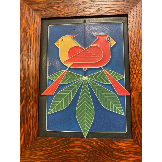 This is a stunning framed Motawi Tileworks "Cardinals Consorting" tile. The oak frame is by Dard Hunter Studios. Motawi’s...