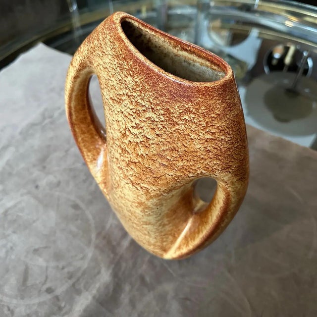 This 1970s modernist Italian ceramic vase has been manufactured by Giovanni Bertoncello, a renowned ceramicist known for...