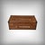 This mahogany trunk presents itself as a robust chest, its deep patina revealing a long history of travel and voyages. Its...