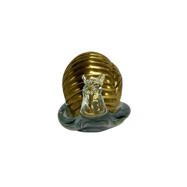 Rare brass and glass snail figurine with a polished finish. A unique decorative collectible to enhance your space or gift...