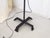 This wrought iron floor lamp has updated wiring and uses up to 100 Watt Edison base bulb.