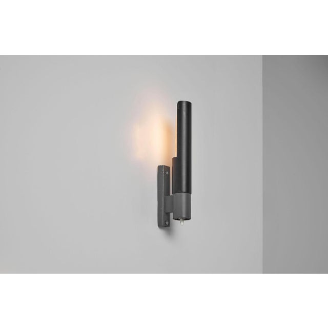 Rare in two tone black and grey model 211 wall lamps designed by Gino Sarfatti and manufactured by Arteluce in Italy in...