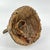 The Lega Bwami Society hat was crafted in the eastern regions of the Democratic Republic of Congo. This woven, palm fiber...