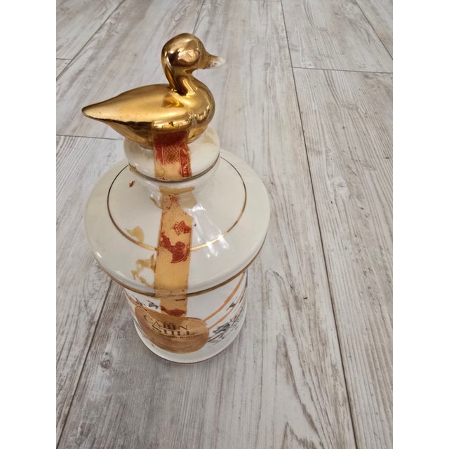 This vintage 1972 limited edition "Wings Across the Continent" bourbon decanter was produced by Old Cabin Still in...