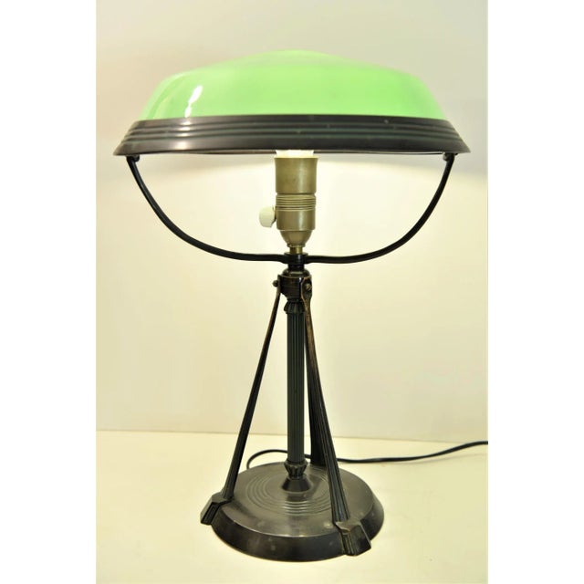 Rare and very unusual Swedish Grace period glass, and what we believe is patinated zinc, table lamp. The lamp is made in...